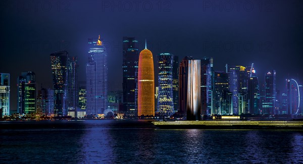 Night scene of the skyline of Doha with Al Bidda Tower