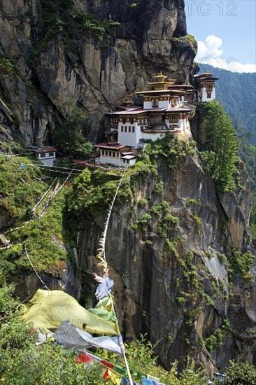 Buddhist prayer flags fluttering at the Tiger's Nest Monastery