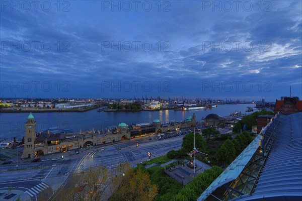 Elbe River with the St Pauli Landing Stages and the Blohm and Voss shipyard at dusk