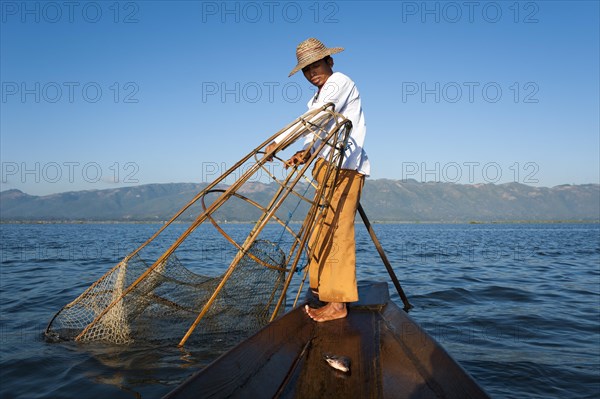 Fishermen with a traditional basket