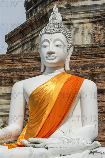 Buddha statue in front of the stupa at Wat Yai Chai Mongkhon