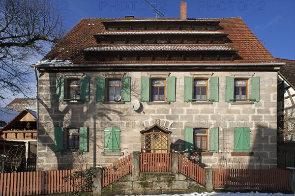 Old Frankish farmhouse with drying hatches for drying hops in the attic