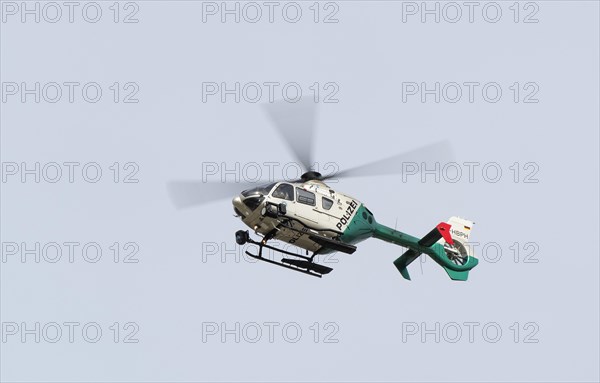 EC135 police Eurocopter in the air at Munich Airport