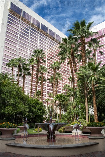 Fountain with flamingo figures in the courtyard of the Hotel Flamingo