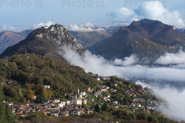 Excursion mountain of San Salvatore with the village of Cisano at the front