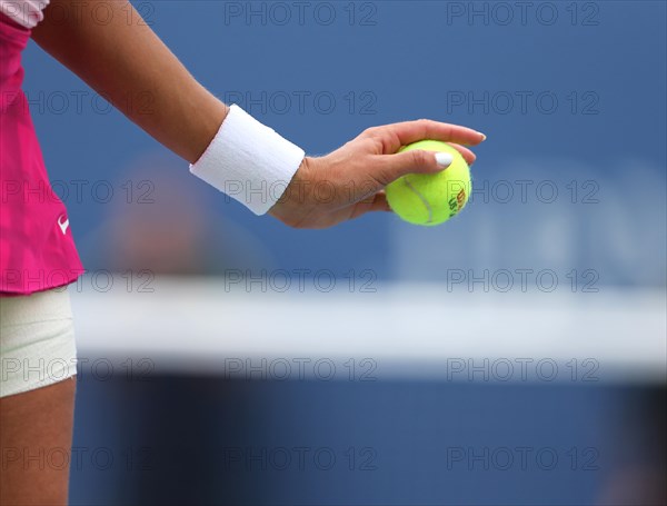 Ball in the hand of a player