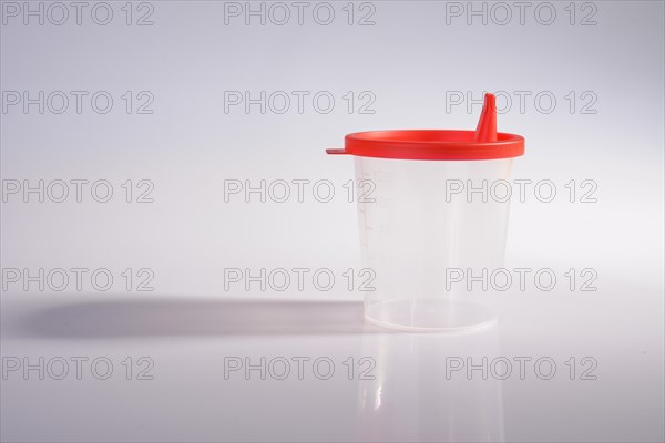 Empty container for urine test