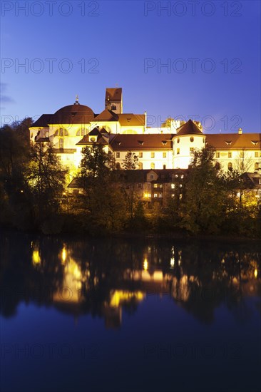 Hohes Schloss castle reflected in river Lech