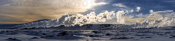 Geyser in a snow-covered landscape