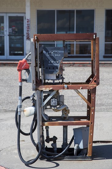 Abandoned gasoline pump at a closed General Store