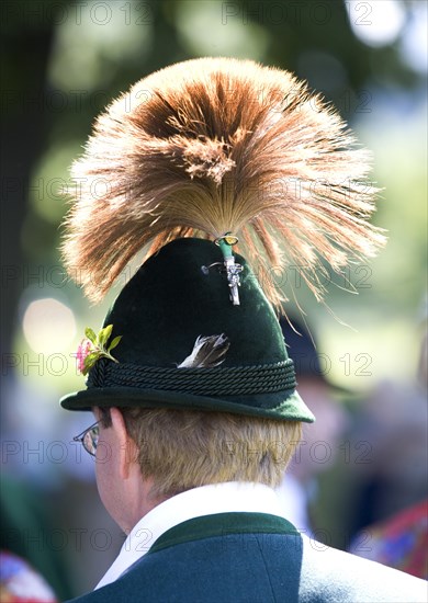 Man wearing traditional Bavarian hat with gamsbart