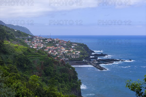 Small village on a mountain side on the coast