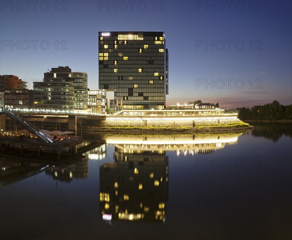 Hyatt Hotel and the Cubana cocktail bar reflected in the water