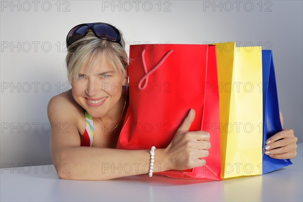 Woman with colorful shopping bags