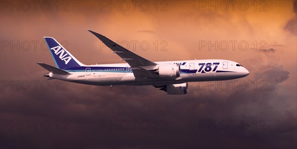 All Nippon Airways Boeing 787-8 Dreamliner in flight in the evening