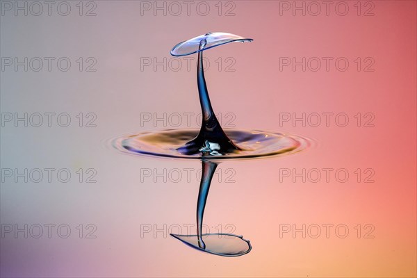 Three drops collide