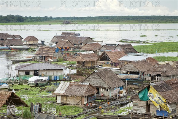 Floating houses on the banks of Rio Itayla