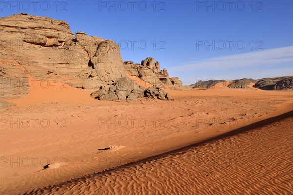 Sand dunes and rocks at Tin Merzouga