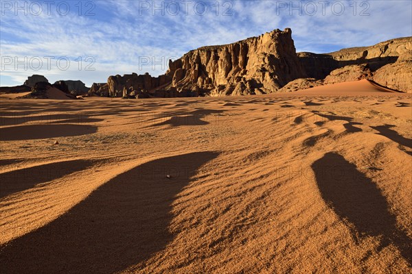 Rock towers and sand dunes at Tamezguida