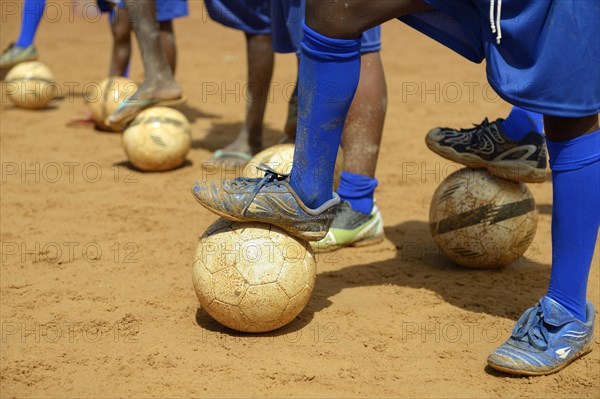 Feet of Brazilian children with balls