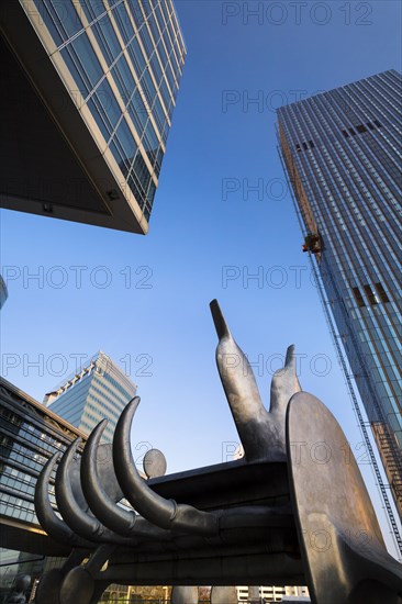 Modern sculpture from the Strabag Kunstforum art gallery in front of the Tech Gate Vienna and DC-Tower buildings