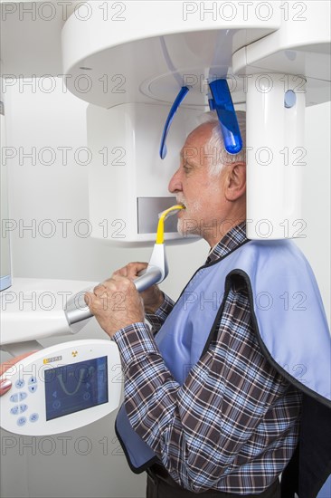 Man receiving an X-ray of his teeth