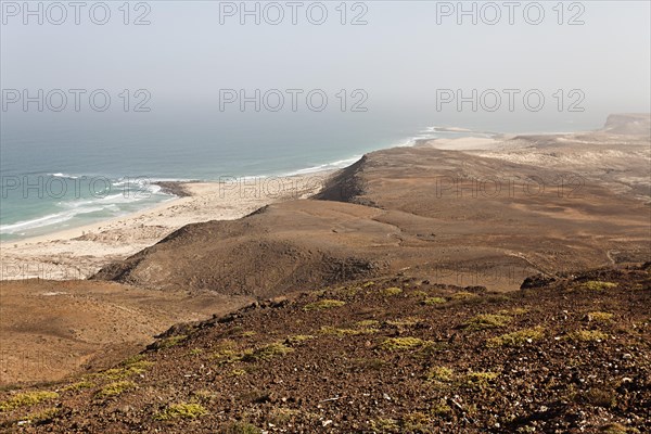 View from the black Mountain Morro Negro down the coast to the south with Praia Mosquito Beach on the east coast