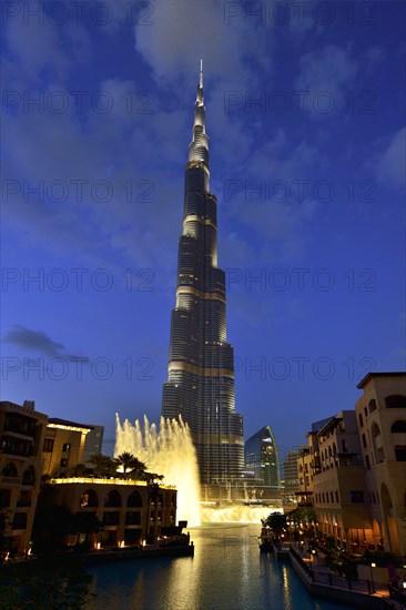 Nighttime water show of The Dubai Fountain at Lake Burj Khalifa in front of Burj Khalifa