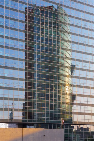 Andromeda Tower reflected in the Tech Gate Vienna building