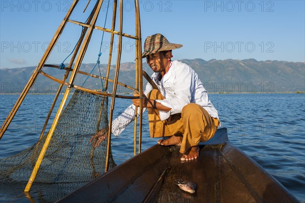 Fishermen with a traditional basket