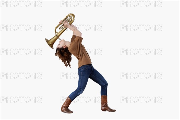 Young Woman playing the trumpet