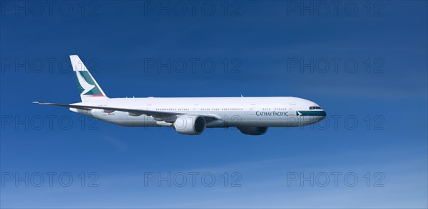 Cathay Pacific Boeing 777-367 ER in flight