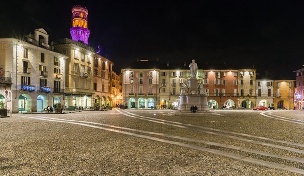 Piazza Cavour with the illuminated Torre the Angel or Angel Tower