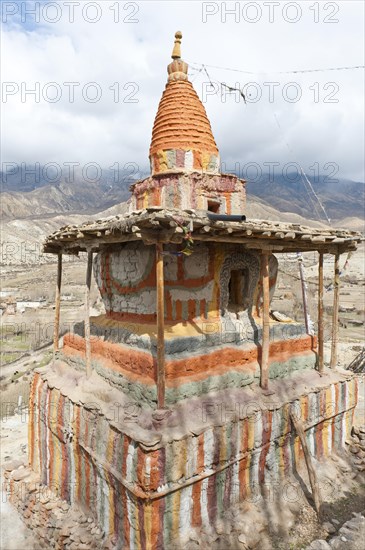 Colourfully decorated Buddhist stupa