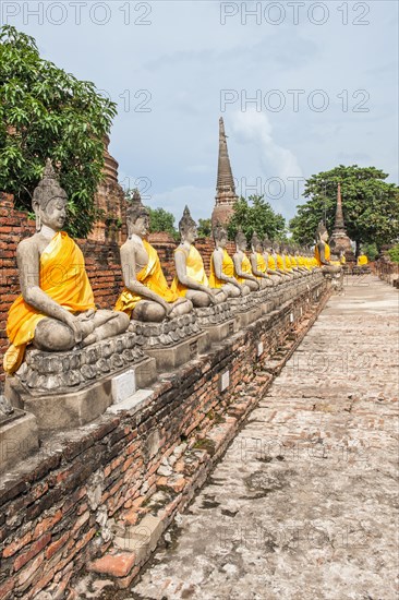 Buddha statues around the central stupa