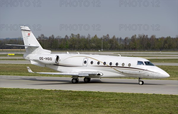 An IAI Gulfstream G200 Galaxy Aviation Mjet jet rolls to the start at Munich Airport