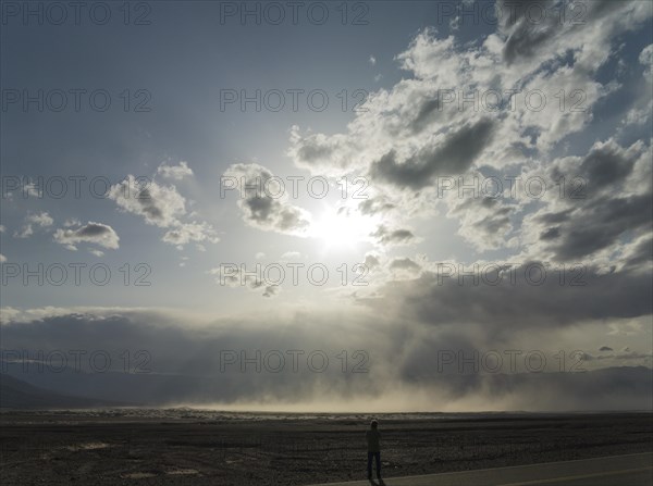 A sand storm over the Mesquite Flat Sand Dunes and the Panamint Range in the evening