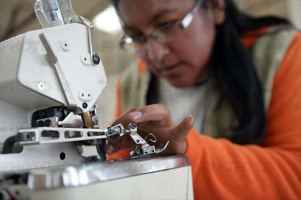 Seamstress working on a sewing machine