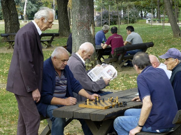 Pensioners playing chess