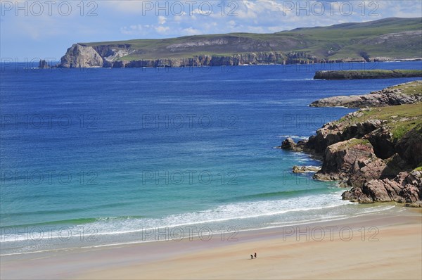 Sandy beach and rocks in Rispond Bay