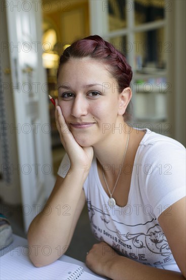 Student studying in the departmental library of the University of Hohenheim in Schloss Hohenheim Palace