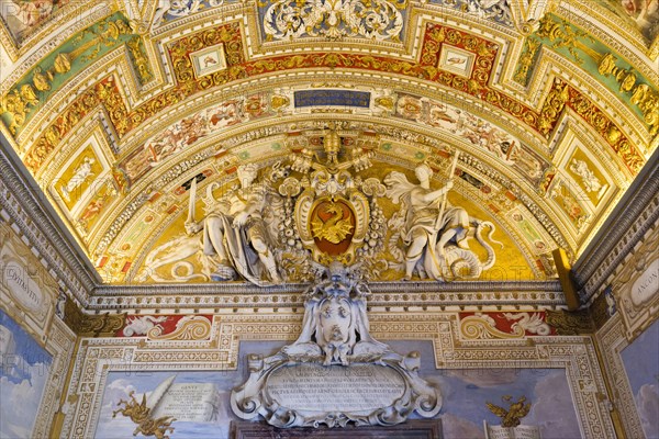 Coat of warms of Pope Urban VIII and stucco ceiling in the Galleria delle Carte Geografiche