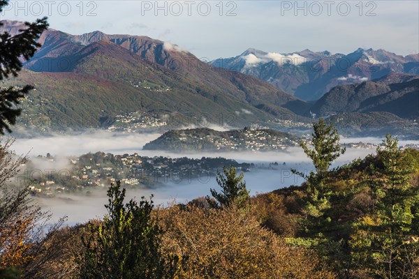 Patches of fog over Lugano on an autumn morning