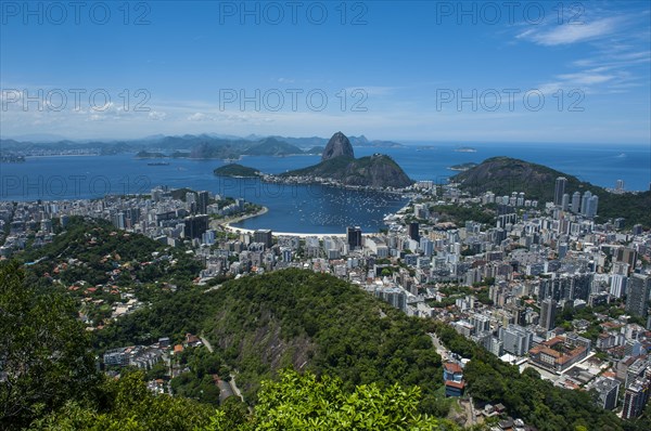 Outlook from the Christ the Redeemer statue over Rio de Janeiro and the Sugar Loaf