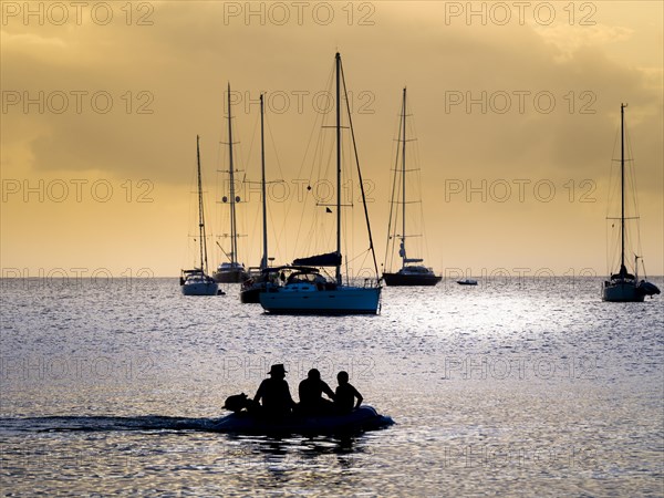 Sailing yachts at twilight near Rodney Bay