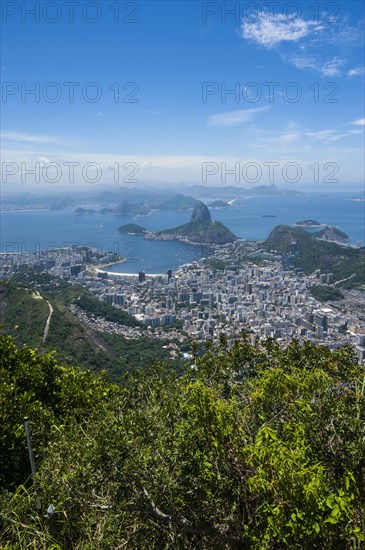 Outlook from the Christ the Redeemer statue over Rio de Janeiro and the Sugar Loaf