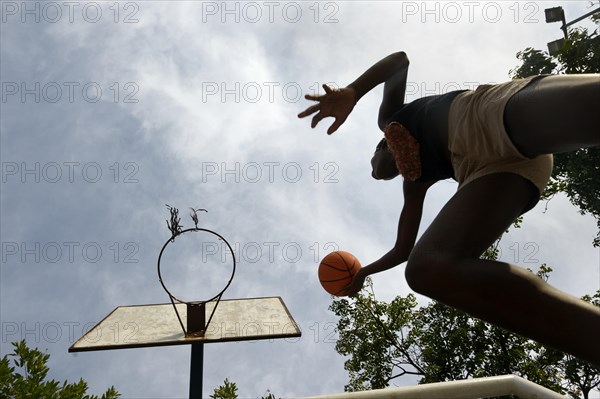 Youth making a layup in basketball