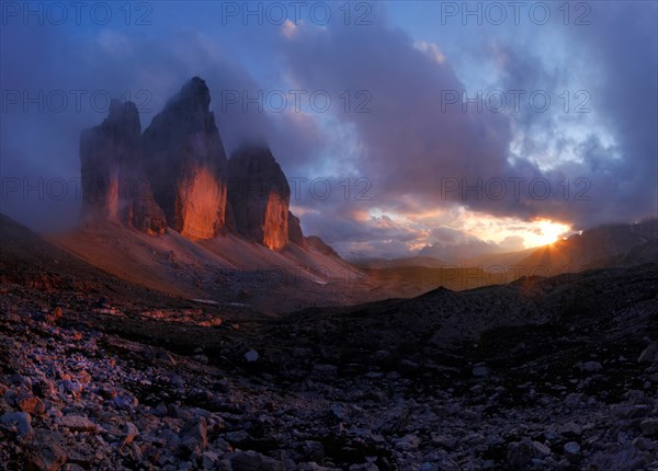 Mountains Tre Cime di Lavaredo or Drei Zinnen in the evening light