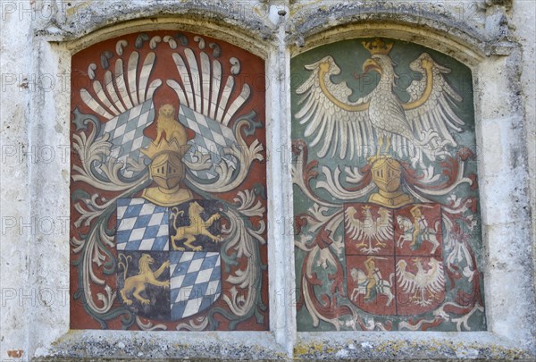 Alliance coat of arms on the castle wall