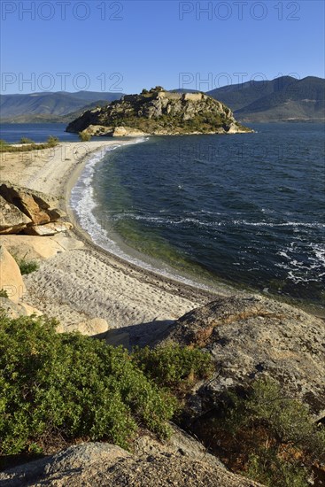 Island with castle on the north shore of Bafa Lake Nature Park